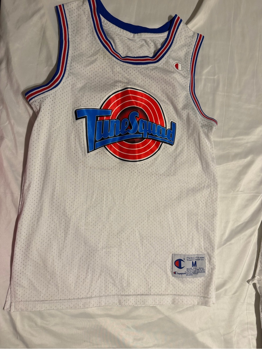 Champion White Tune Squad Basketball Jersey with Red and Blue Logo